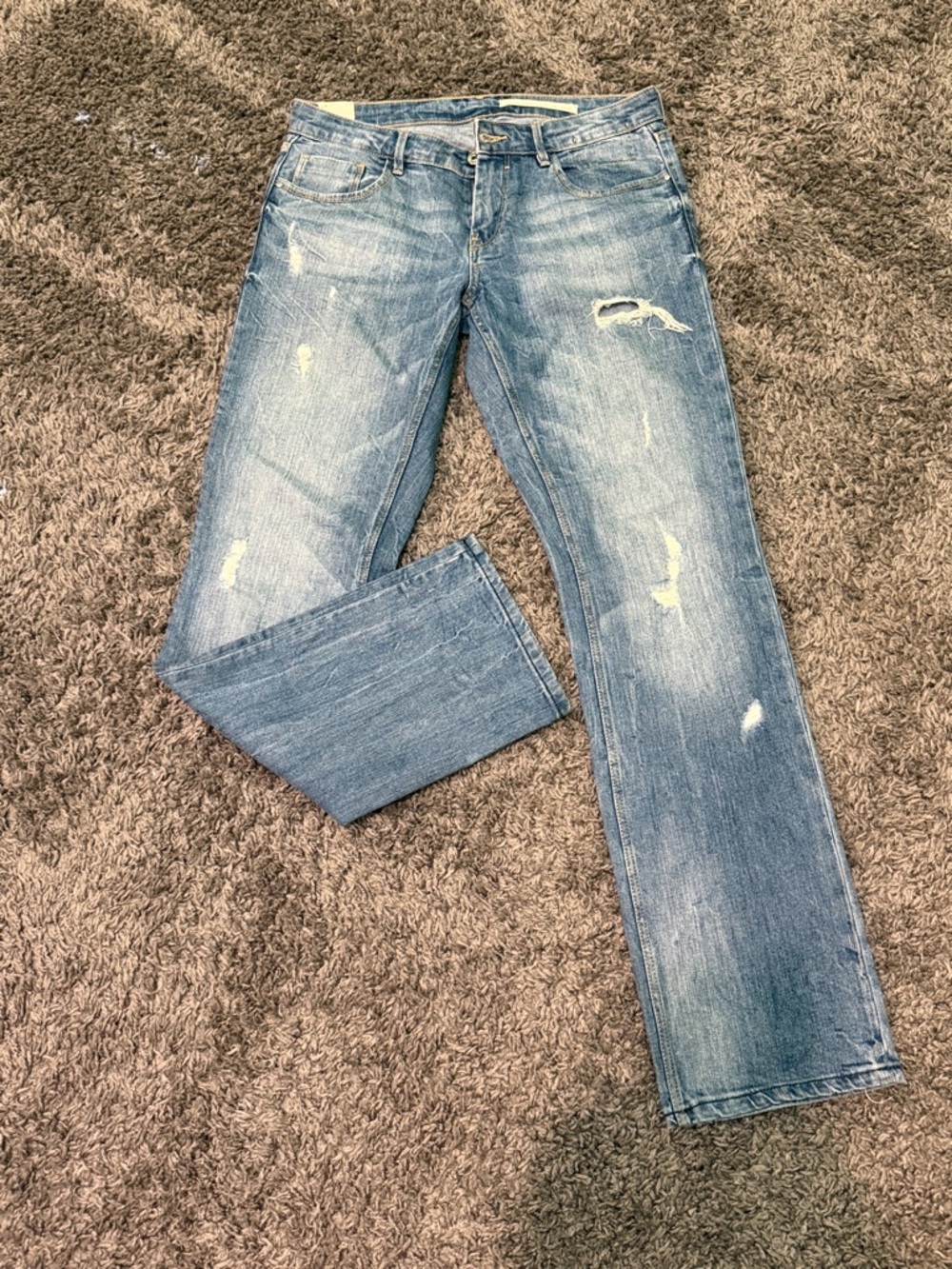 Women’s Distressed Light Blue Jeans